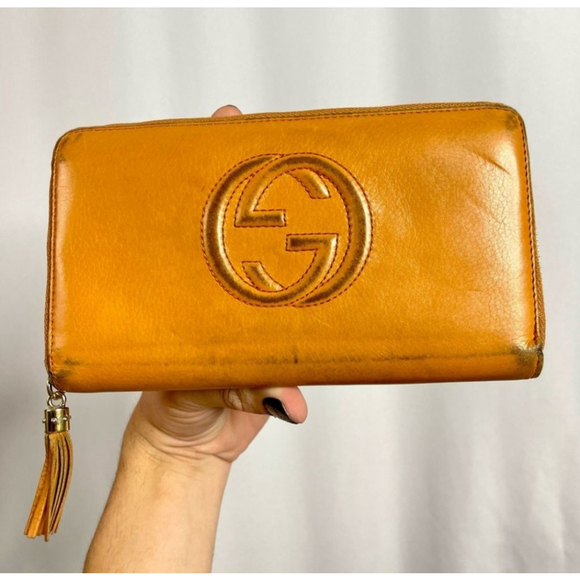 Gucci Handbags - GUCCI | Large orange leather interlocking GG logo soho zip-around wallet